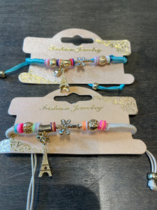 STRETCHY BRACELET WITH CHARMS